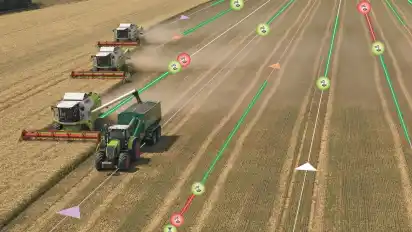 Mähdrescher und Abfuhrgespanne koordinieren den Überladevorgang und Abtransport des Ernteguts.GRAFIKEN: FR