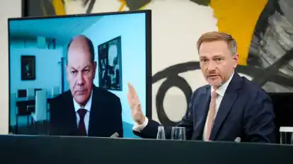 Bundesfinanzminister Christian Lindner (FDP) und Bundeskanzler Olaf Scholz (SPD) sprechen in Berlin über die Ampel-Pläne zur Energiekrise.